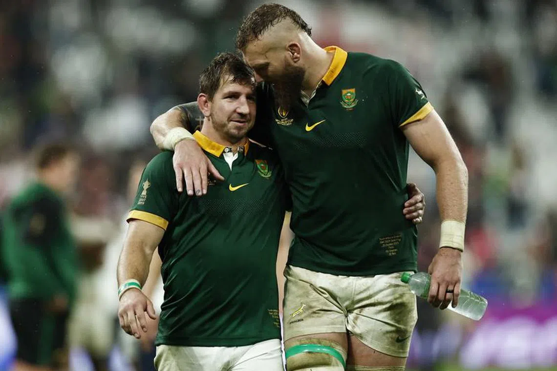 Rugby Union - Rugby World Cup 2023 - Semi Final - England v South Africa - Stade de France, Saint-Denis, France - October 21, 2023 South Africa's Kwagga Smith and RG Snyman celebrate after the match as South Africa reach the final REUTERS/Gonzalo Fuentes