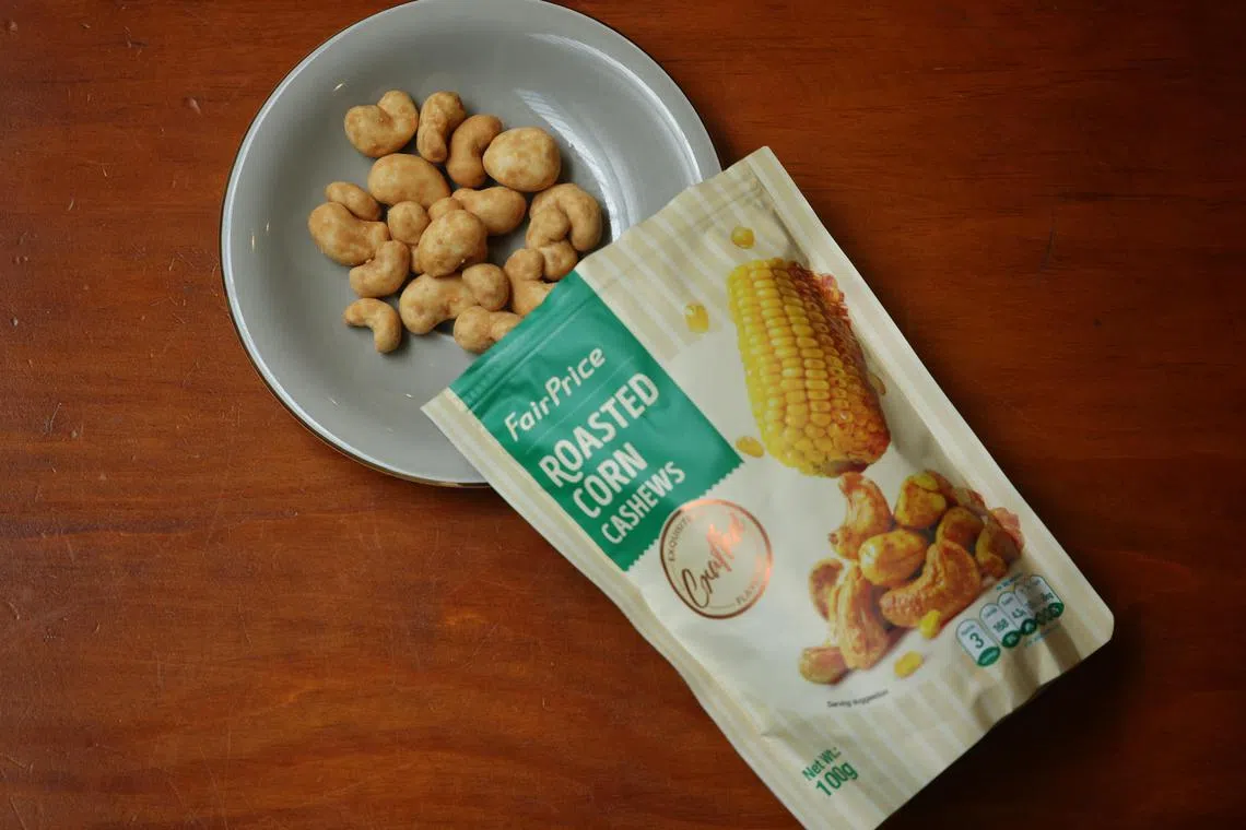 ST20241202_202405700563/bestsnack14/Hsueh/Jason Quah

FairPrice's house brand roasted corn cashews pictured Dec 2, 2024. ST PHOTO: JASON QUAH