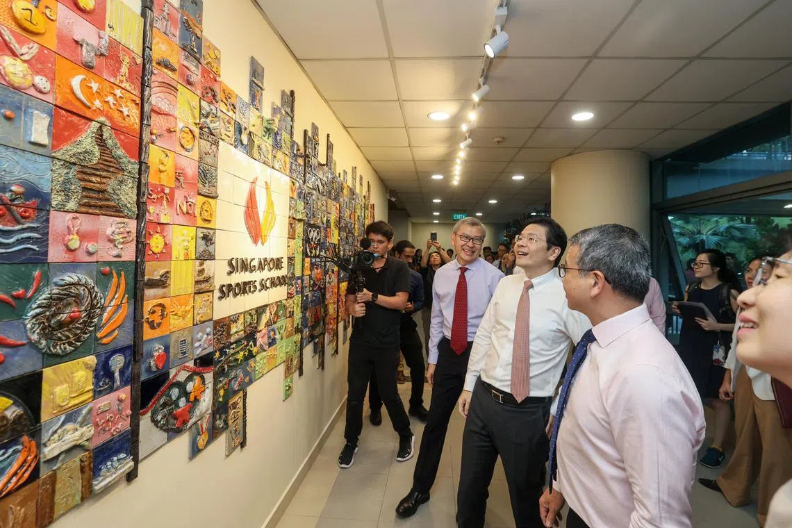 The Singapore Sports School's 20th Anniversary Celebrations and Awards Night attended by DPM Lawrence Wong and Minister Edwin Tong, unveiling the ‘Wall of Aspirations’.