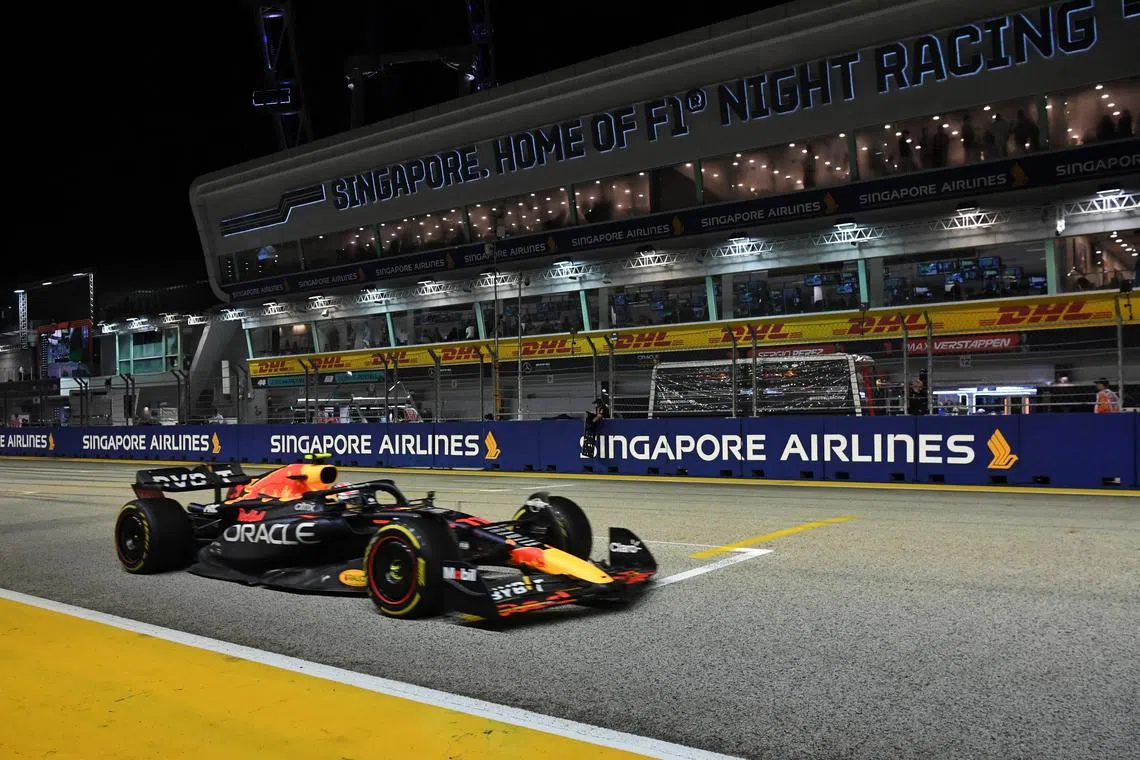 Segio Perez of Oracle Red Bull Racing in action during the race at the Formula One Singapore Airlines Singapore Grand Prix at Marina Bay street circuit on October 2, 2022. [NOTE: F1 photos are for editorial use only and NOT for sale] The Formula One Singapore Airlines Singapore Grand Prix at Marina Bay street circuit on October 2, 2022.