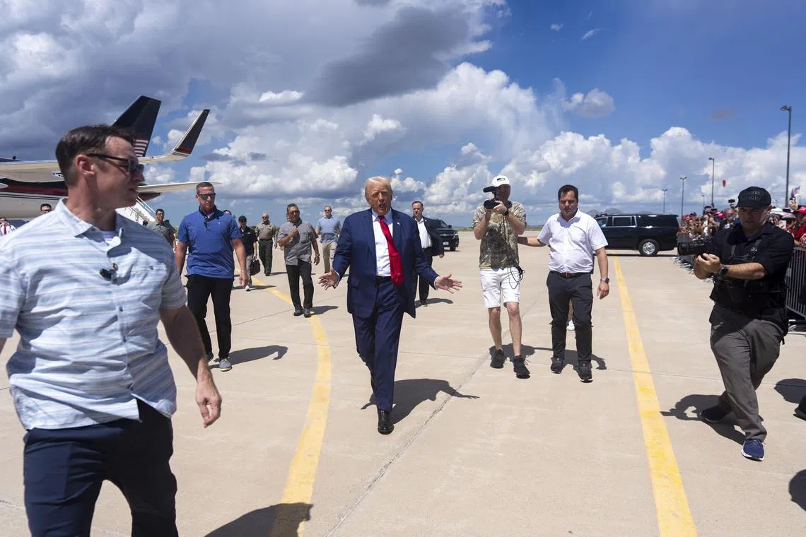 Former US president Donald Trump walking over to greet supporters upon his arrival in Cochise County, Arizona, on Aug 22.