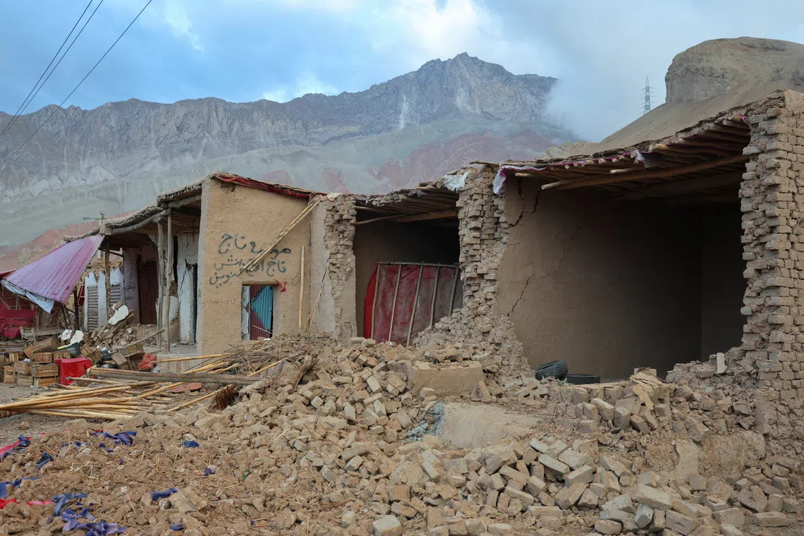 Damaged shops stand in ruin in the aftermath of an earthquake, in Samangan province, Afghanistan, November 4, 2025. REUTERS/Sayed Hassib