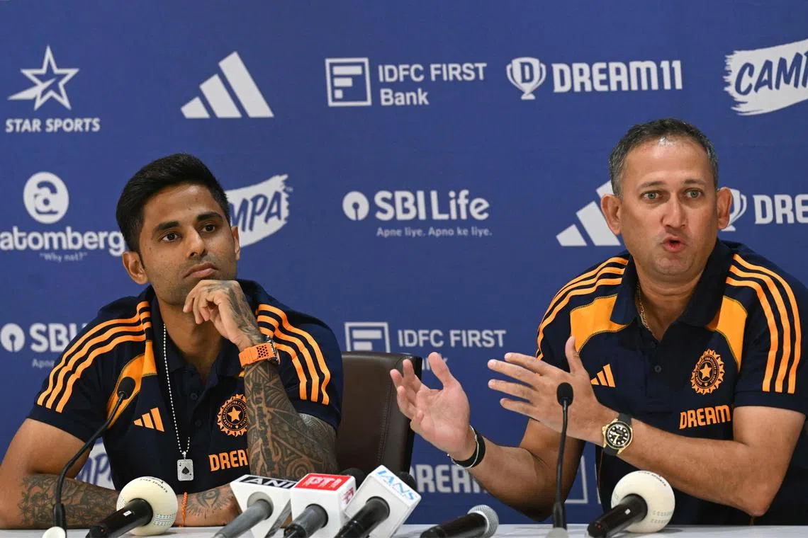 Indian cricket captain Suryakumar Yadav and Ajit Agarkar, chairman of Board of Control for Cricket in India (BCCI) selection committee, at an Aug 19, 2025 press conference in Mumbai to announce the T20 squad for the men’s Asia Cup.