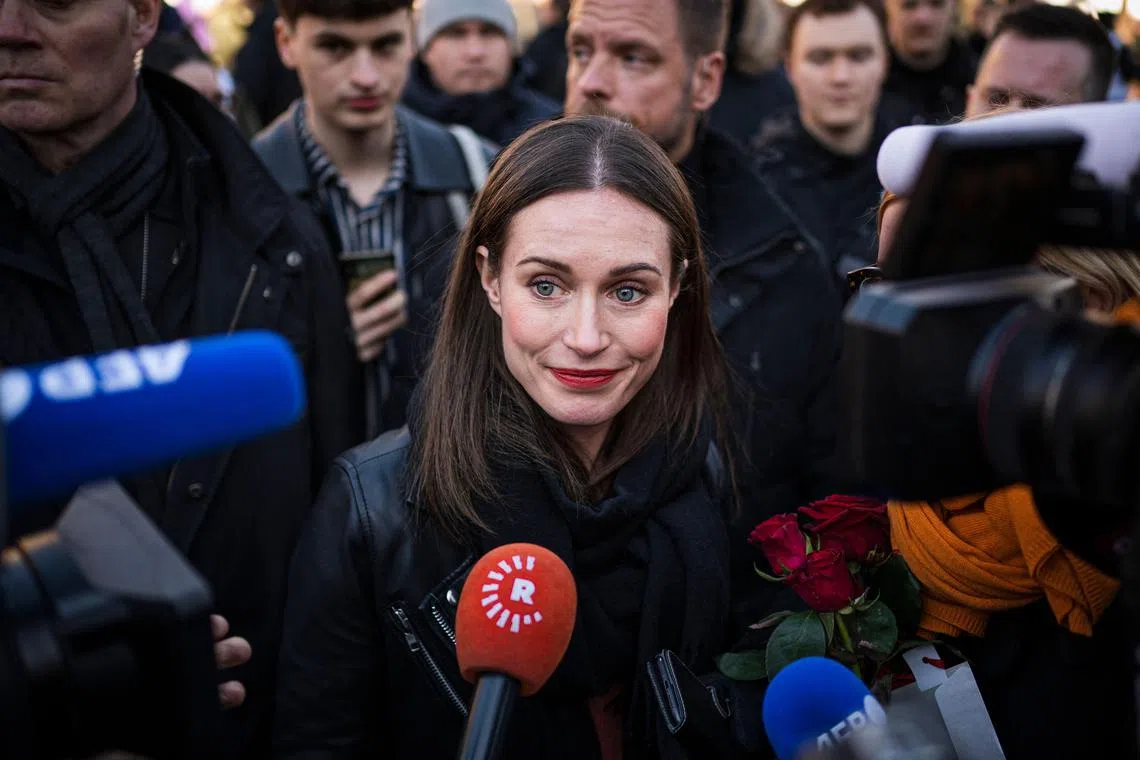 Finnish Prime Minister Sanna Marin speaks to the media during an election rally in Helsinki.