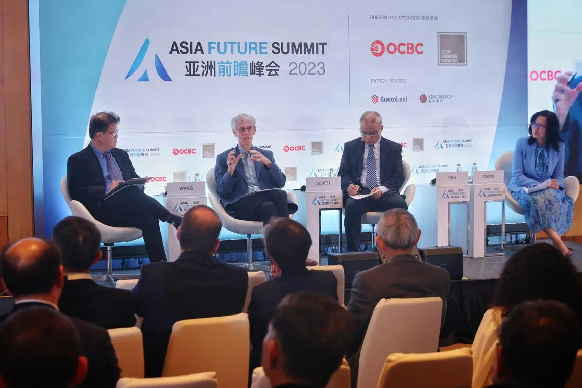 (From left) Law expert Wang Jiangyu, veteran China watcher Orville Schell and Nanjing University international relations expert Zhu Feng on a panel at the Asia Future Summit 2023, moderated by ThinkChina editor Chow Yian Ping.