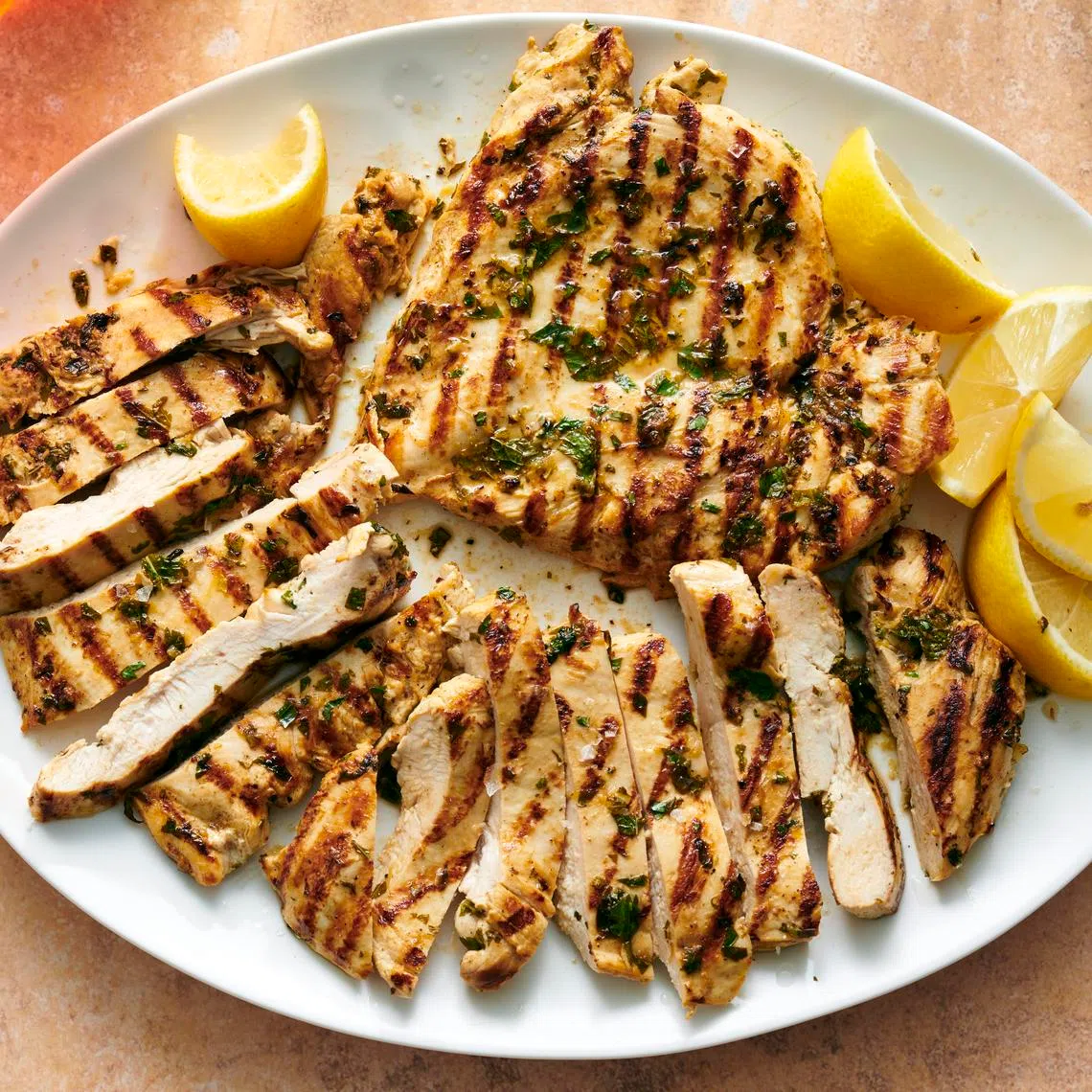 Lemon-garlic grilled chicken breasts.