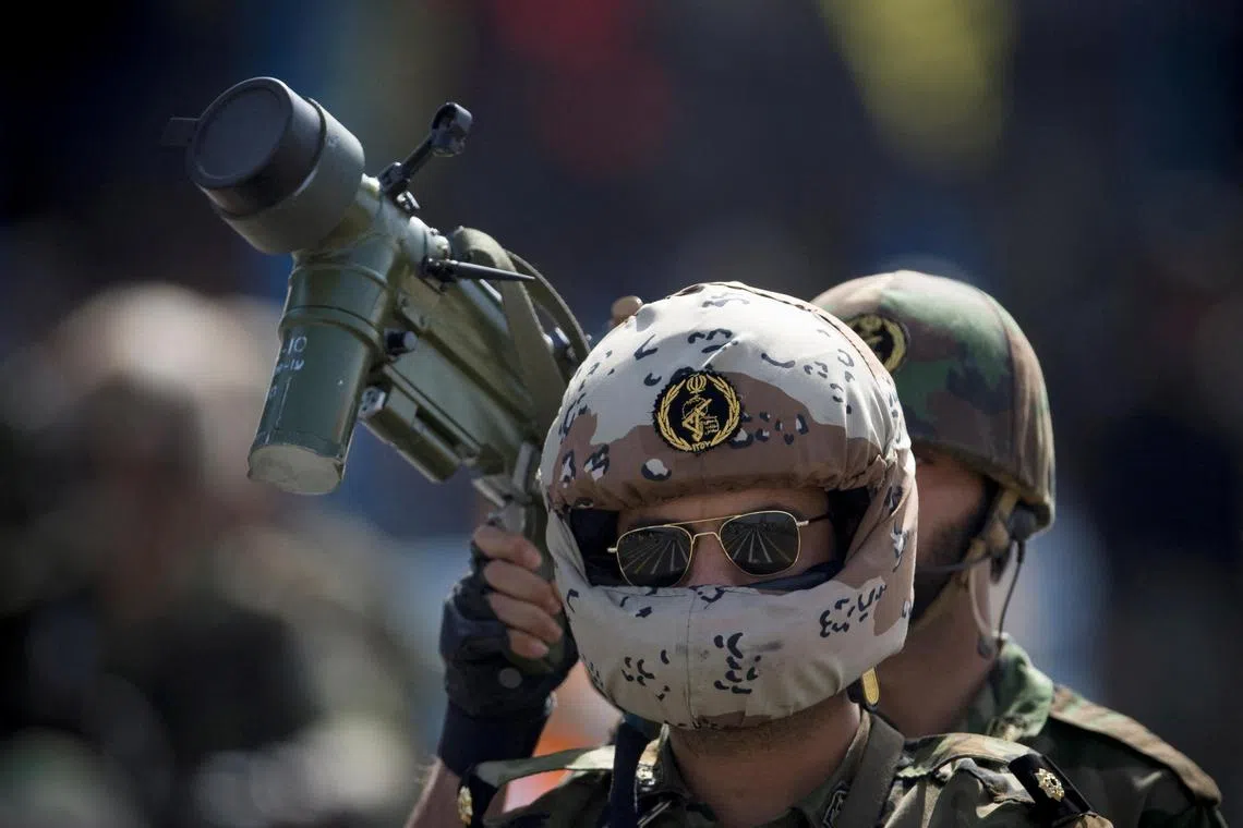 FILE PHOTO: Members of Iran's Revolutionary Guards participate in a military parade to commemorate the anniversary of the start of the 1980-1988 Iran-Iraq war, in Tehran REUTERS/Morteza Nikoubazl (IRAN)/File Photo