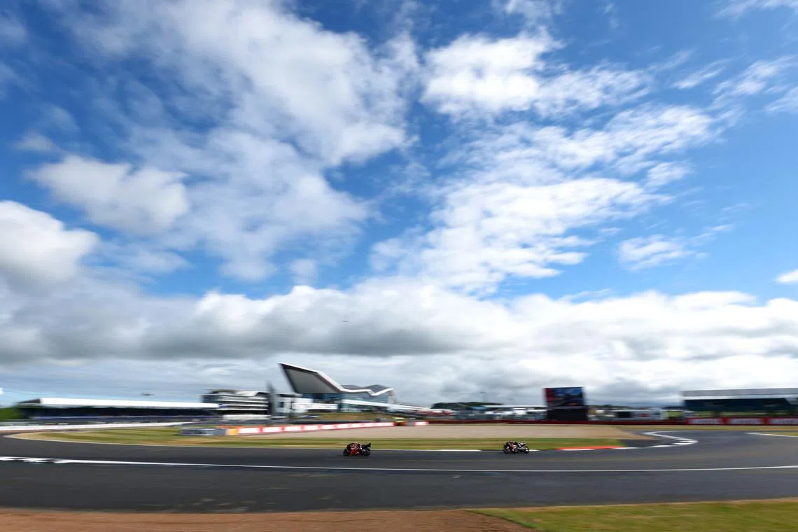 MotoGP - British Grand Prix - Silverstone Circuit, Silverstone, Britain - May 25, 2025 General view of riders in action during warm up ahead of the race Action Images via Reuters/Andrew Boyers