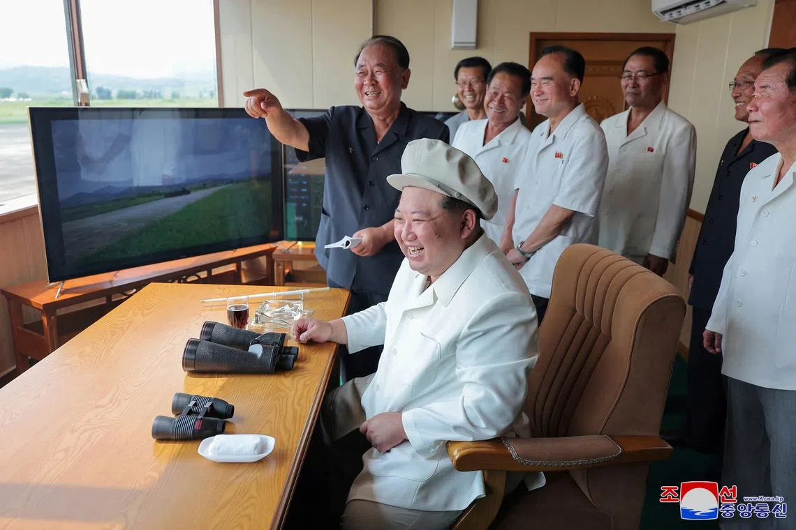 FILE PHOTO: North Korean leader Kim Jong Un oversees a performance test of drones during a visit to the Drone Institute of North Korea's Academy of Defence Sciences at an undisclosed location in North Korea, August 24, 2024, in this photo released by North Korea's official Korean Central News Agency.    KCNA via REUTERS/File Photo