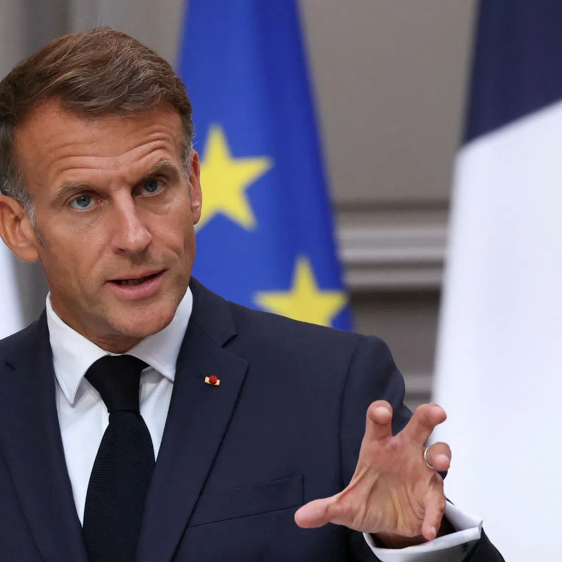 FILE PHOTO: France's President Emmanuel Macron addresses the audience during a press conference following a meeting with candidates for the 2027 presidential election and party leaders focused on the geopolitical situation and its consequences, at the presidential Elysee Palace in Paris, France. on September 18, 2026. THOMAS SAMSON/Pool via REUTERS/ File Photo