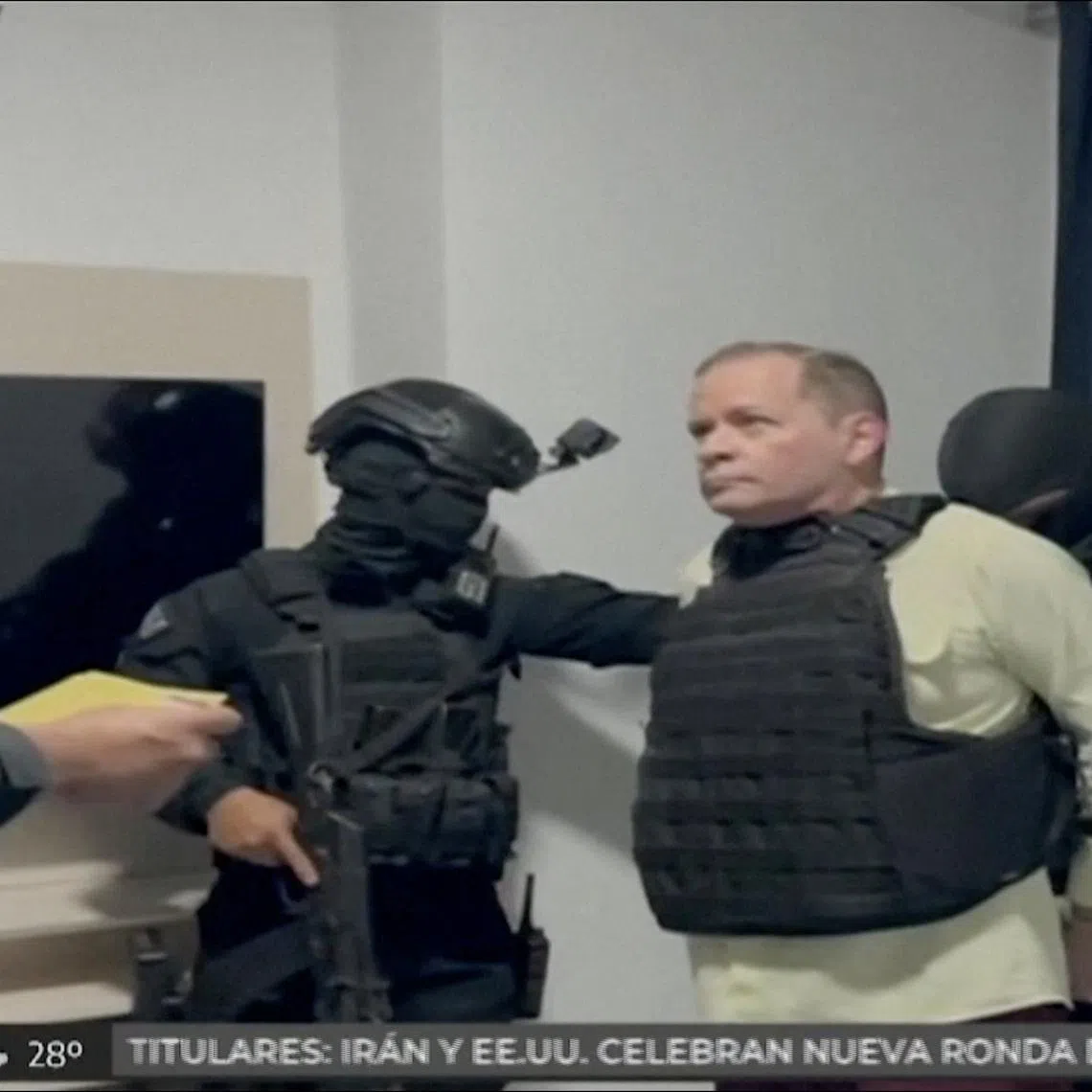 This screen grab from May 23, 2025, shows Venezuela opposition leader Juan Pablo Guanipa being detained by Venezuelan law enforcement officers.
