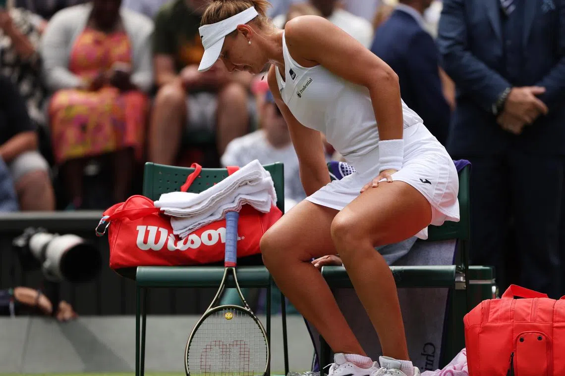Beatriz Haddad Maia retires from her match against Wimbledon champion Elena Rybakina in London on July 10, 2023.