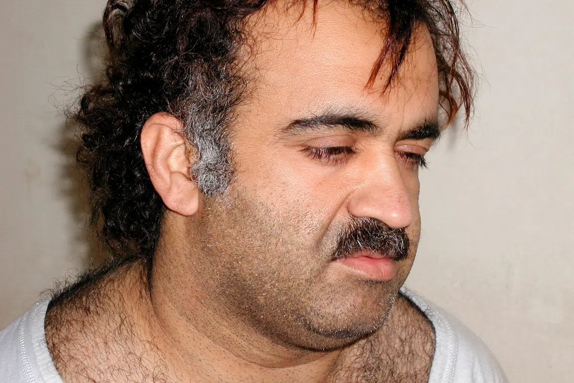 Khalid Sheikh Mohammed is shown in this file photograph during his arrest on March 1, 2003.