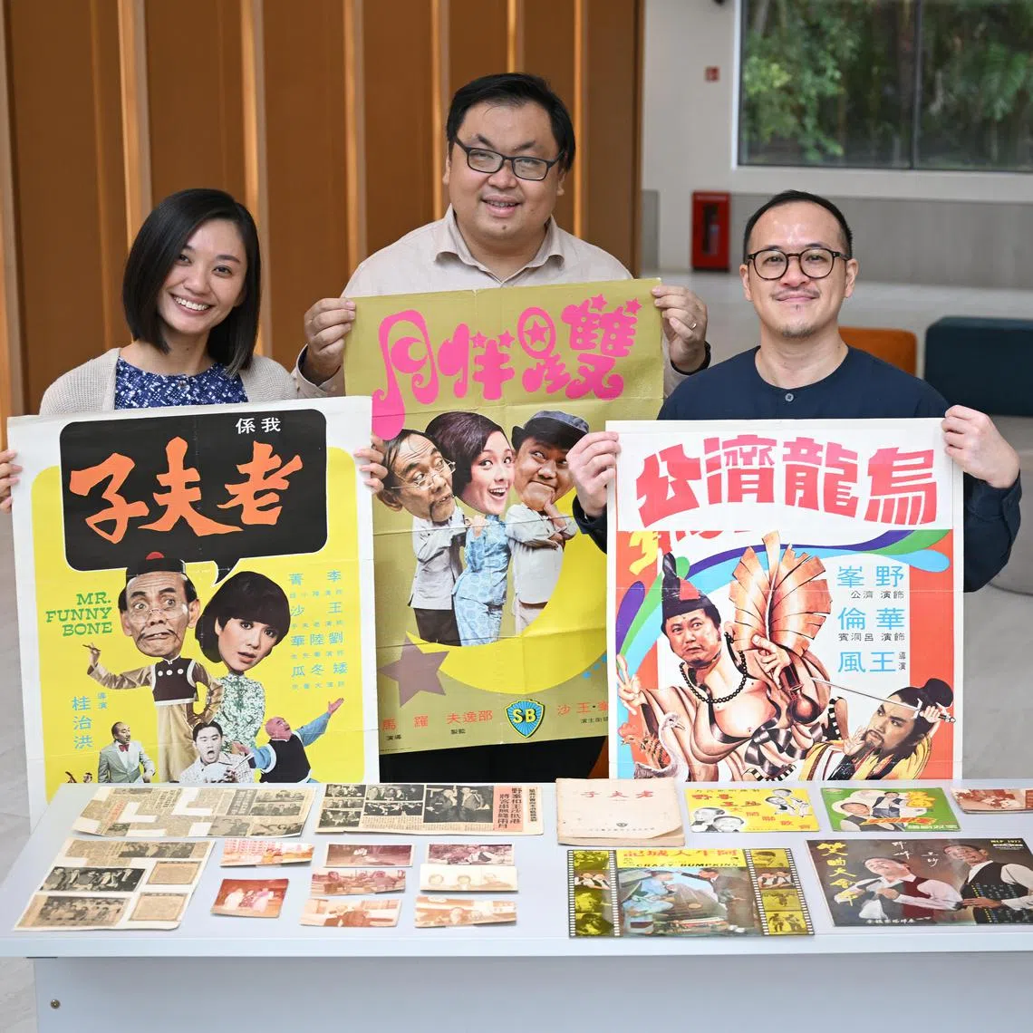 ST20231219_202363913689/sfcomedy/Shintaro Tay/Chin Soo Fang/ Chinese academic and exhibition curator Yeo Min Hui, Private collector and researcher Su Zhangkai, and Asian Film Archive Senior Archivist Chew Tee Pao at the Oldham Theatre at the National Archives Singapore on Dec 19, 2023.
For the first time in Singapore, a retrospective on comedians Wang Sha and Ye Feng will be showcased by the Asian Film Archive with an accompanying exhibition from 12 January to 7 April 2024 at the Oldham Theatre.
Wang Sha (1925 – 1998) and Ye Feng (1932 – 1995) graced the stages of amusement parks and beamed from the television screens between the 1960s to the early 1990s. Adored and celebrated by audiences across Hong Kong, Malaysia, Singapore, and Taiwan, this dynamic duo enjoyed a versatile and illustrious career, leaving an indelible mark in music, theatre, and over 40 feature films.