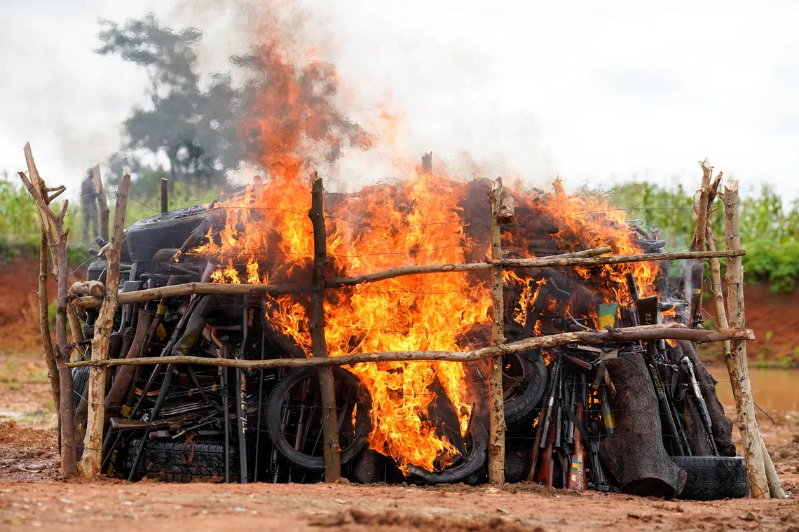 Recovered, illicitly acquired, decommissioned and unserviceable firearms burn during a public destruction exercise organised by the National Centre for the Control of Small Arms and Light Weapons in Abuja, Nigeria, July 30, 2026. REUTERS/Marvellous Durowaiye