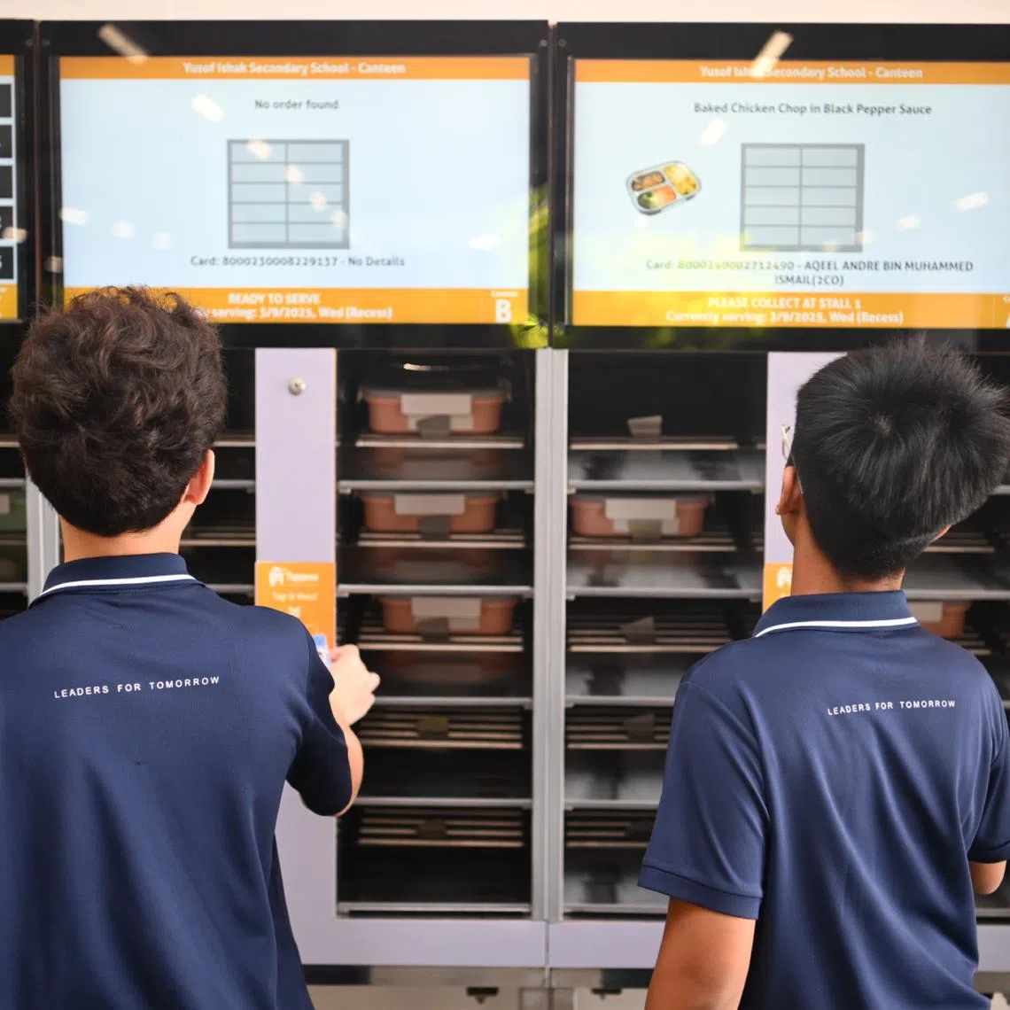 Yusof Ishak Secondary School students taking meals from the meal dispensers during recess on Sept 3.