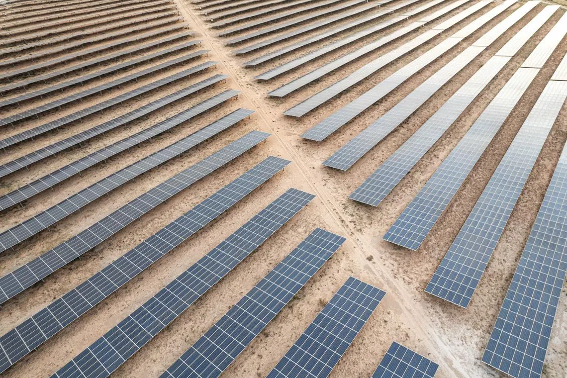 This aerial view shows the panels of the large 50 Megawatt solar farm just outside Nouakchott on September 25, 2023. Mauritania wanted to achieve 20% of renewable energy in their energy mix by 2020 (they reached this goal in 2018 with 38% of renewable energy in their mix.) The Minister of Environment and Sustainable Development aims to increase the share of renewable energy to 50% by 2030. (Photo by MED LEMINE RAJEL / AFP)