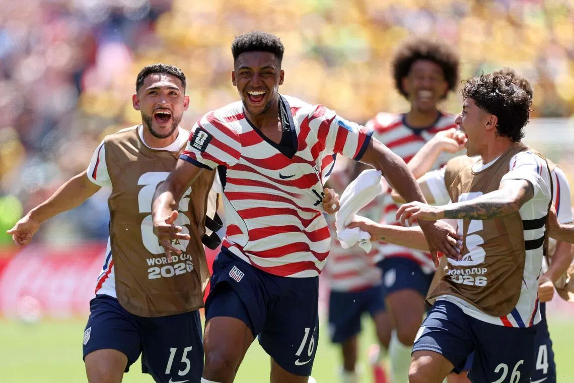 Alex Freeman (second from left) celebrating the United States' second goal in their 2-0 World Cup win over Australia at Lumen Field in Seattle on June 19, 2026.