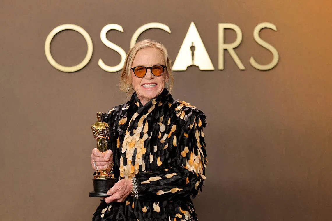 HOLLYWOOD, CALIFORNIA - MARCH 15: Amy Madigan, winner of the Best Actress in a Supporting Role award for “Weapons”, poses in the press room during the 98th Oscars at Dolby Theatre on March 15, 2026 in Hollywood, California.   Brianna Bryson/Getty Images/AFP (Photo by Brianna Bryson / GETTY IMAGES NORTH AMERICA / Getty Images via AFP)