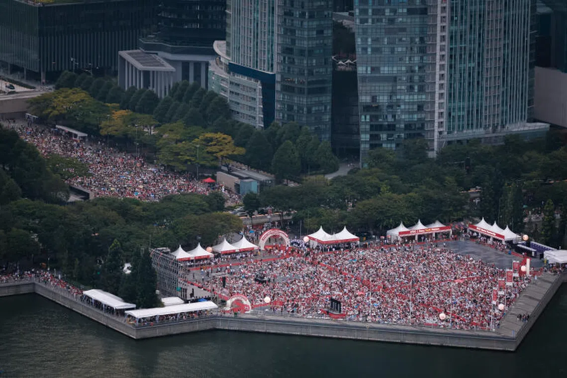 Some 7000 members of public at The Promontory @ Marina Bay for the NDP as seen from MBS SkyPark Observation Deck on Aug 9.
