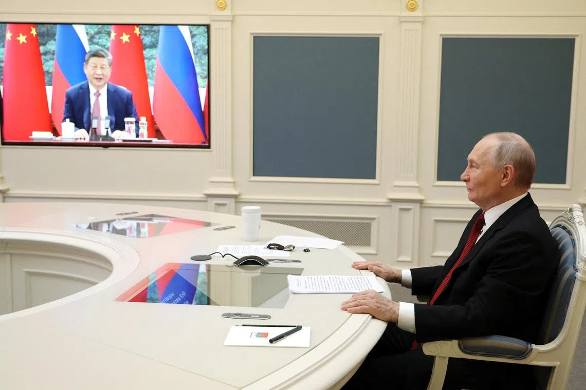 Russia's President Vladimir Putin holds talks with China's President Xi Jinping via video link from Moscow, Russia, February 4, 2026. Sputnik/Vyacheslav Prokofyev/Pool via REUTERS