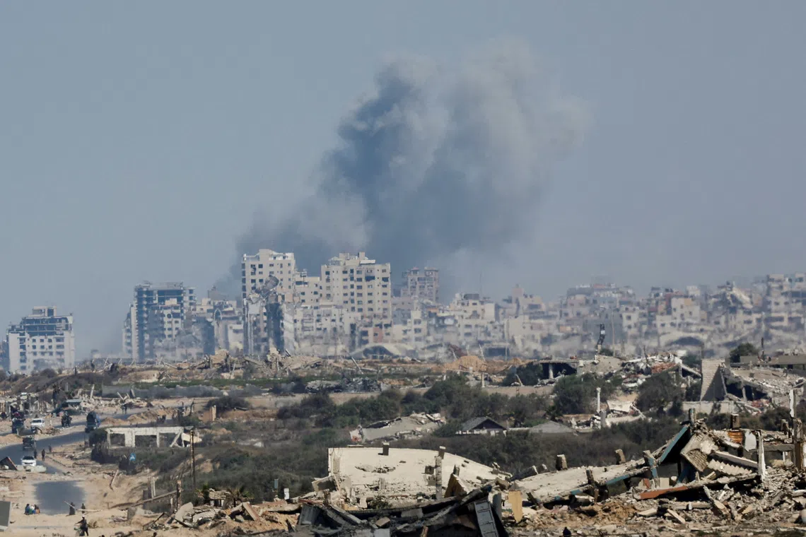 The aftermath of an Israeli military operation in Gaza City, as seen from the central Gaza Strip on Sept 29.