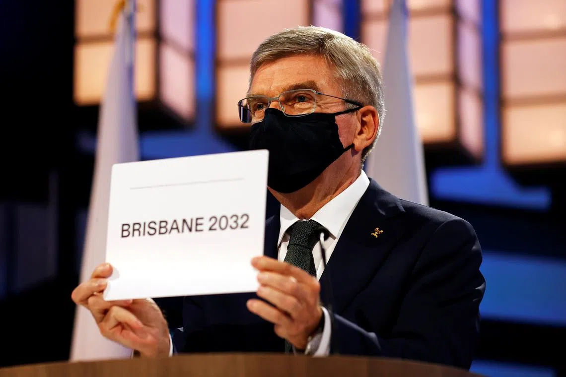 FILE PHOTO: Olympics - 138th IOC Session - Hotel Okura, Tokyo, Japan - July 21, 2021 President of the International Olympic Committee Thomas Bach announces Brisbane as the 2032 Summer Olympics host city during the 138th IOC Session Pool via REUTERS/Toru Hanai/File Photo