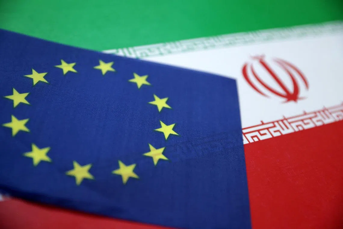 European Union and Iran flags are seen in this illustration taken June 18, 2025. REUTERS/Dado Ruvic/Illustration/File Photo