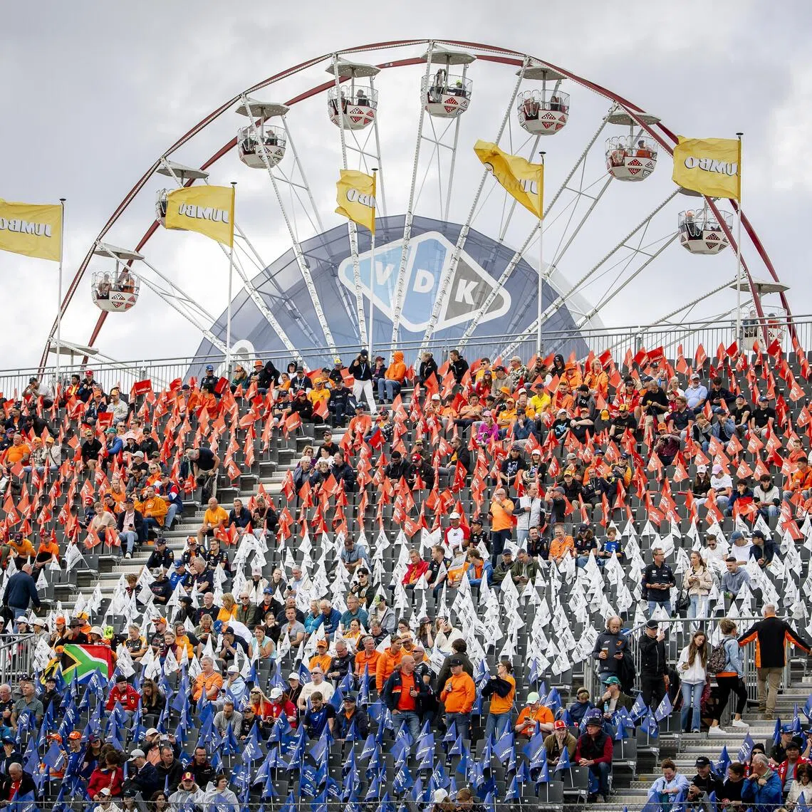 Spectators in the stands ahead of the Formula One Dutch Grand Prix at the Circuit Zandvoort racetrack in the Netherlands, on Aug 23.