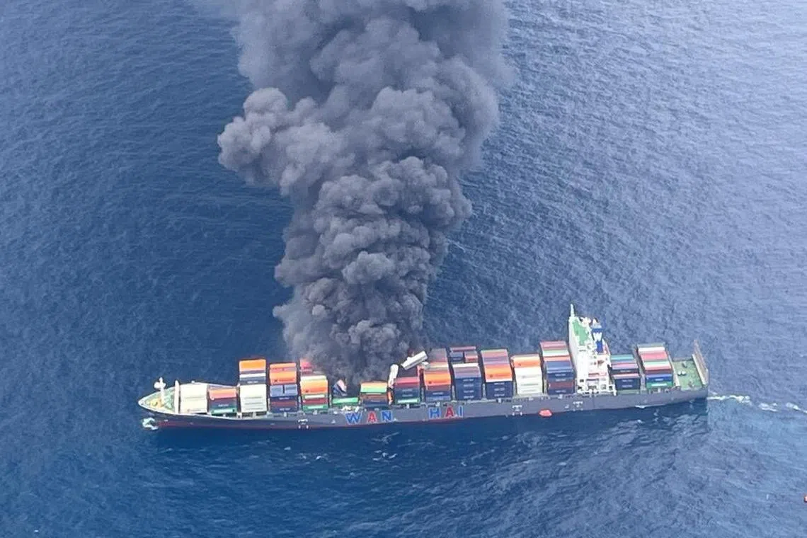 Pictures and videos show a thick plume of black smoke rising from the Singapore-registered ship.