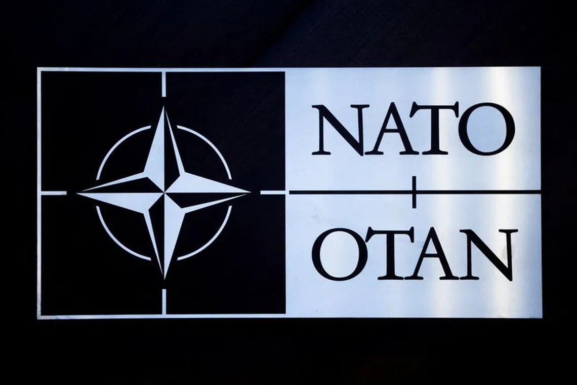 FILE PHOTO: The logo of NATO is seen at a meeting of the North Atlantic Council in the NATO defence ministers' session together with Sweden as the invitee, at the Alliance's headquarters in Brussels, Belgium February 15, 2024. REUTERS/Johanna Geron/File Photo