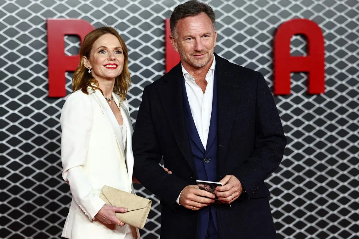 Red Bull Formula One team principal Christian Horner 
 and his wife British singer Geri Halliwell posing on the red carpet upon arrival for the UK premier of "Ferrari" at the Odeon Luxe Leicester, in central London, on Dec 4.
