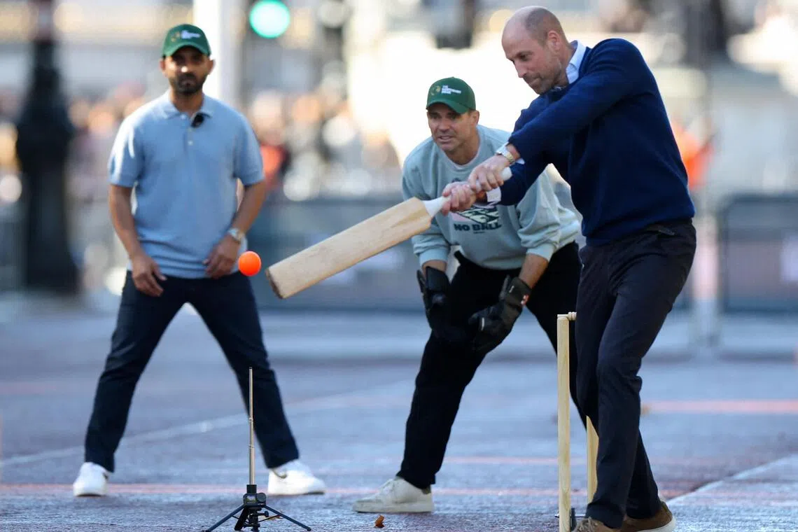 Britain’s Prince William hitting a shot on Oct 13 as he joins cricket stars for an informal game on The Mall in the lead-up to the annual Earthshot Prize awards in Mumbai next month.