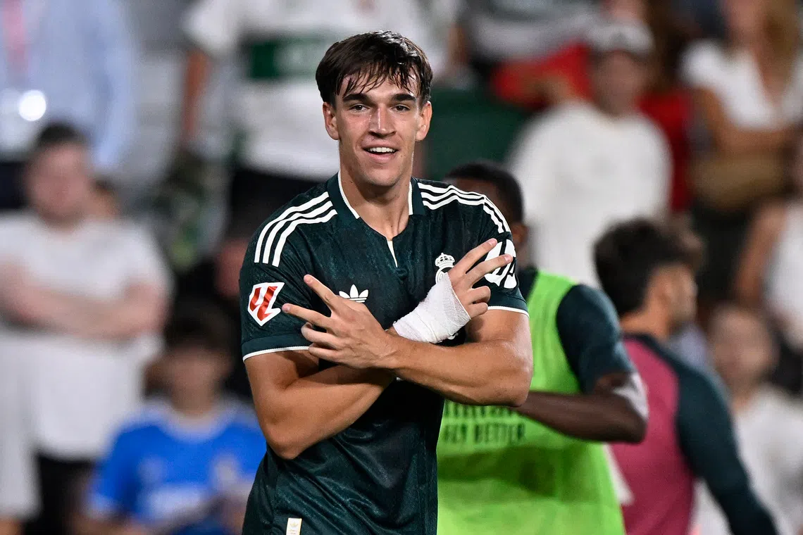 Real Madrid’s Carlos Espi celebrates scoring the winner for his side.