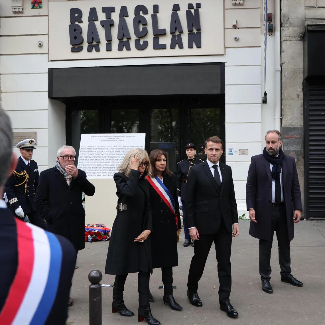 French President Emmanuel Macron and his wife, Mrs Brigitte Macron, outside the  Bataclan concert hall, where 90 people were killed during the 2015 Paris attacks that left 132 people dead.