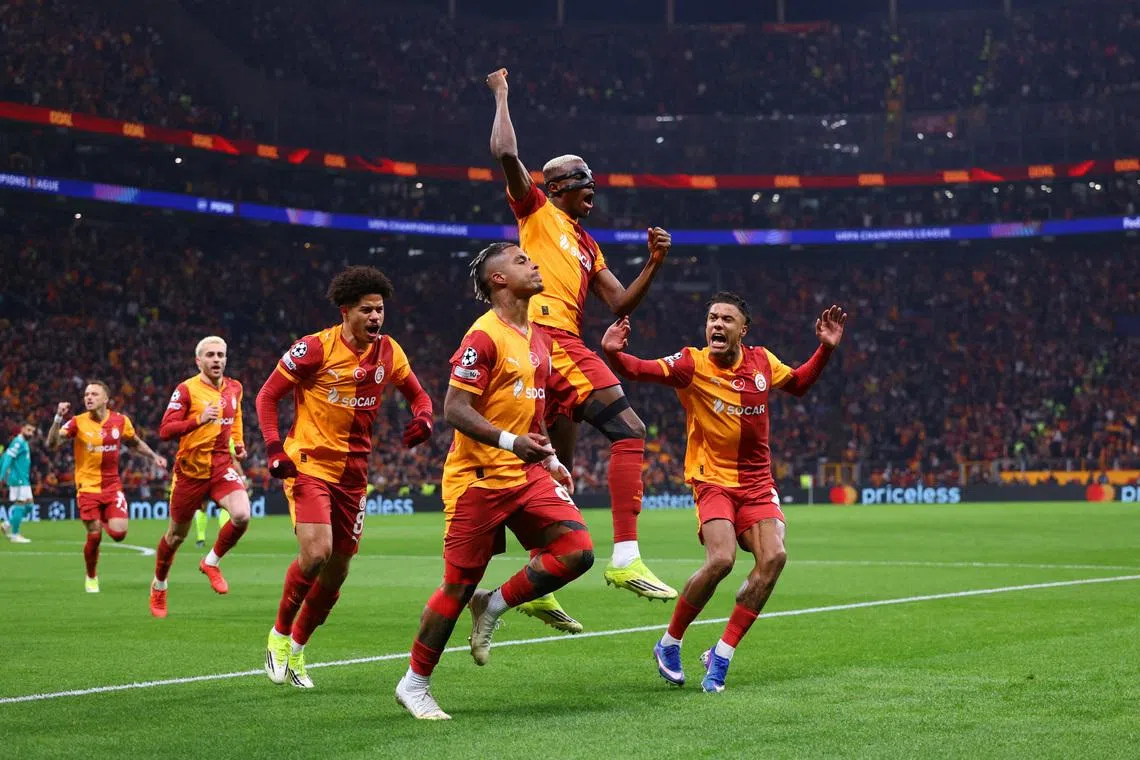 Soccer Football - UEFA Champions League - Round of 16 - First Leg - Galatasaray v Liverpool - Rams Park, Istanbul, Turkey - March 10, 2026 Galatasaray's Mario Lemina celebrates scoring their first goal with Victor Osimhen REUTERS/Murad Sezer