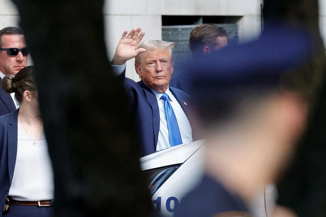 Former U.S. President Donald Trump leaves a Manhattan courthouse after attending the first day of the trial of himself, his adult sons, the Trump Organization and others in a civil fraud case brought by state Attorney General Letitia James, in New York City, U.S., October 2, 2023. REUTERS/Eduardo Munoz