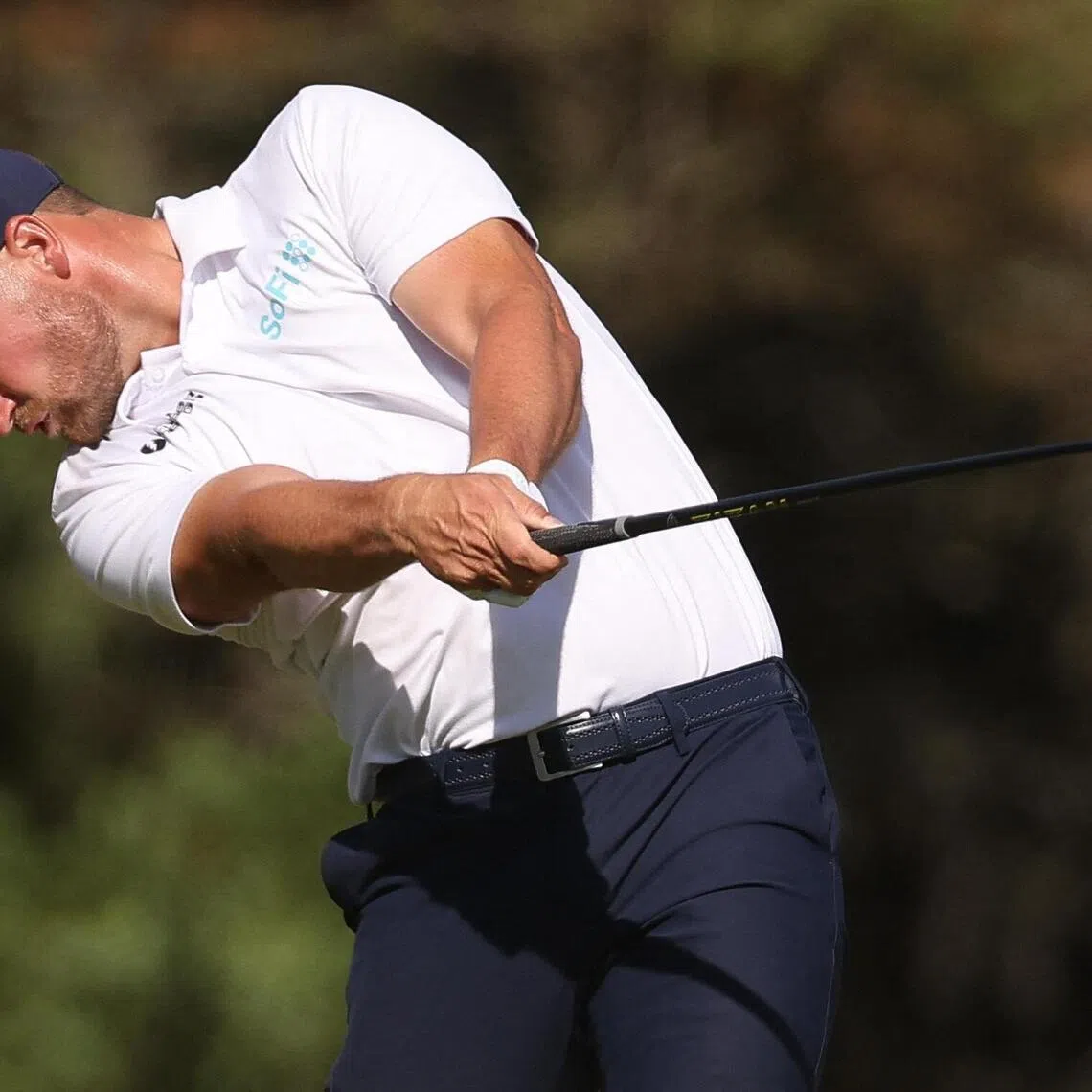 Leader Wyndham Clark playing his tee shot on hole 6 during the third round of the US Open golf tournament at Shinnecock Hills Golf Club. 