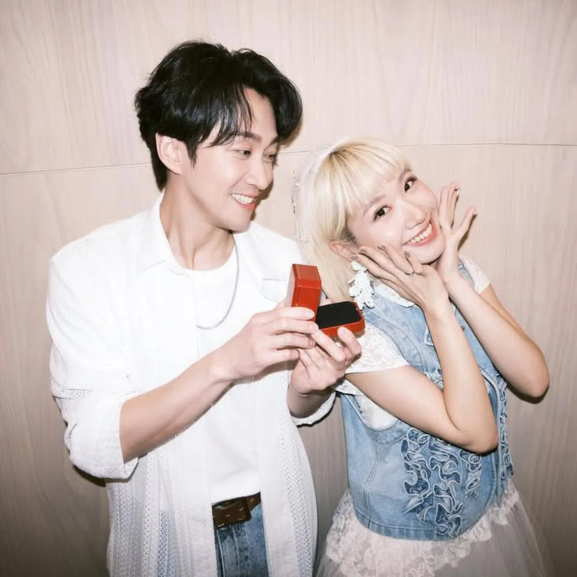 Taiwanese hosts Lulu Huang (right) and Hank Chen Han-dian (right) made the announcement on Instagram on Sept 11.
