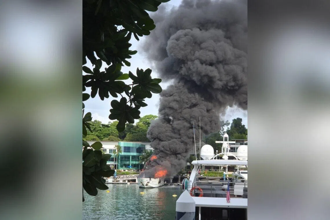 Luxury yacht at Sentosa Cove marina catches fire; no reporte