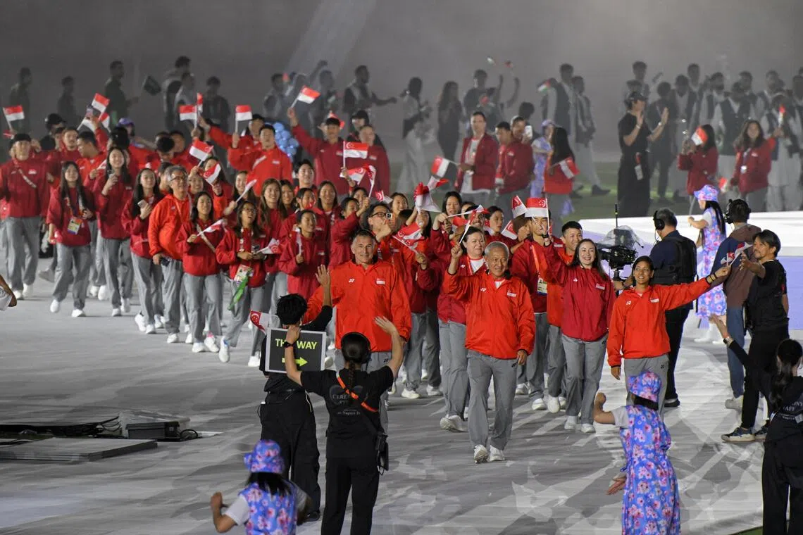 The Singapore contingent marches out during the Asian Games closing ceremony held at the Paloma Mizuho Stadium in Nagoya, Aichi, on Oct 4.