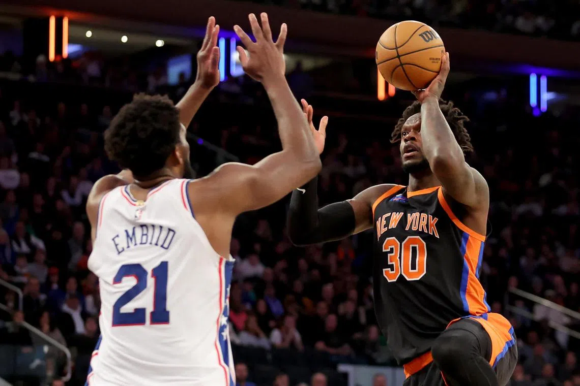 New York Knicks forward Julius Randle (30) taking a shot against Philadelphia 76ers center Joel Embiid at the Madison Square Garden. Randle scored a team-high 24 points in their 108-97 comeback win.