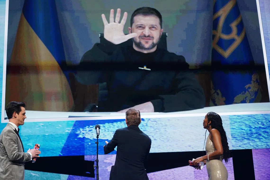 Ukrainian President Volodymyr Zelensky appears on screen at the opening ceremony of the Berlin film festival.