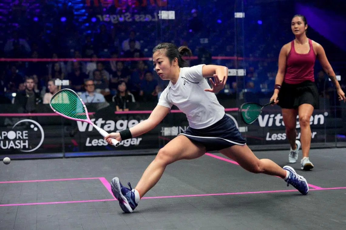 Singapore’s Au Yeong Wai Yhann (left) in action during her 11-5, 11-4, 11-5 defeat by Malaysia’s Rachel Arnold. Au Yeong, 24, is looking to turn professional in mid-2024 after she graduates from the University of the West of England.
