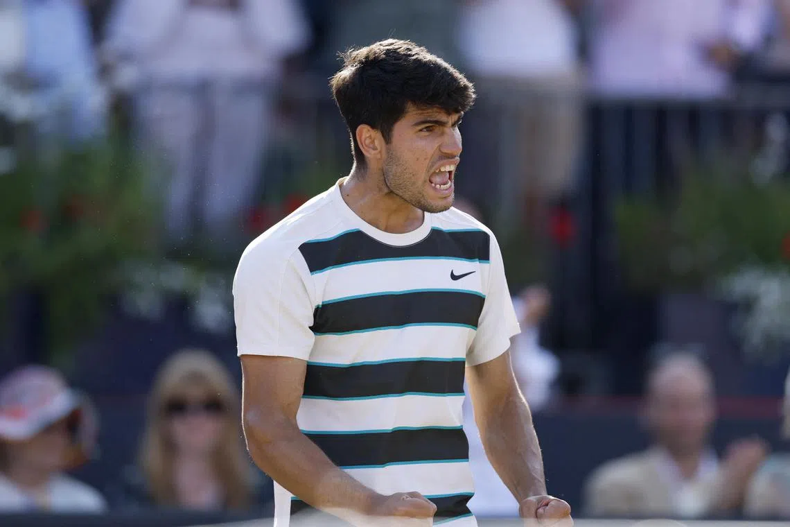 Spain's Carlos Alcaraz celebrates after winning his quarter-final match against France's Arthur Rinderknech.