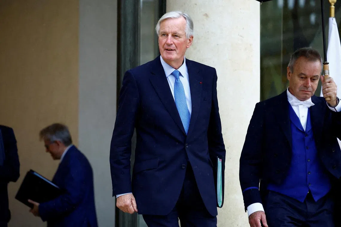 FILE PHOTO: French Prime Minister Michel Barnier leaves following the first weekly cabinet of the new government at the Elysee Palace in Paris, France, September 23, 2024. REUTERS/Sarah Meyssonnier/File Photo