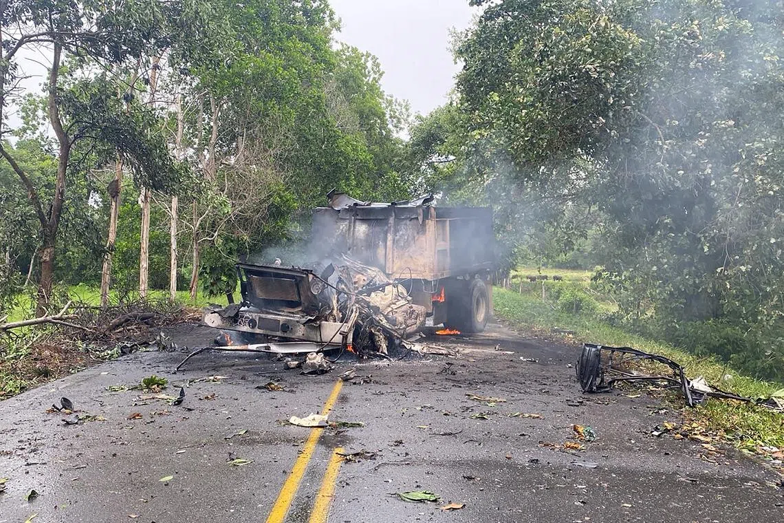 A truck loaded with explosives used in an attack attributed to ELN guerrillas against a military base, burns in Puerto Jordan, Colombia September 17, 2024. Colombian Army/Handout via REUTERS/File Photo