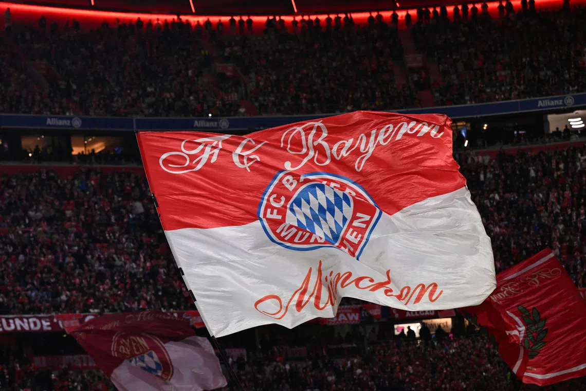 Soccer Football - Bundesliga - Bayern Munich v Werder Bremen - Allianz Arena, Munich, Germany - September 26, 2025 Bayern Munich display a giant flag inside the stadium before the match REUTERS/Angelika Warmuth
