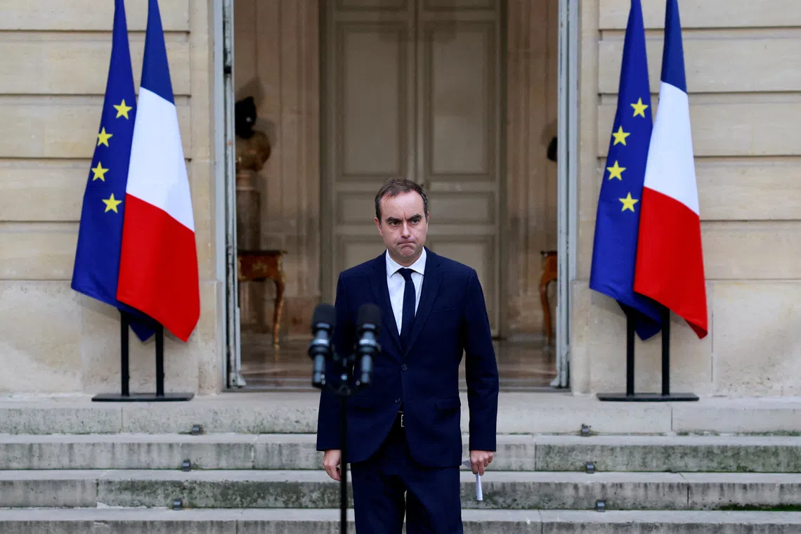 French outgoing Prime Minister Sebastien Lecornu arrives to deliver a statement in the courtyard at the Hotel Matignon in Paris after launching a series of talks with political parties' leaders as France faces a political crisis following the announcement of the resignation of the new government, France, October 8, 2025. REUTERS/Stephanie Lecocq/Pool