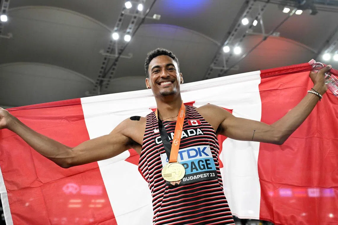Gold medalist Pierce Lepage celebrates his win.